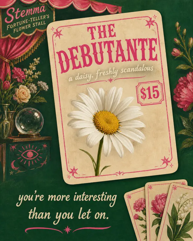 The Debutante: a white daisy on a fortune card, with the reading ‘you’re more interesting than you let on.’